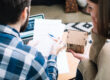 Homebuyers comparing their mortgage rate quotes with a lender