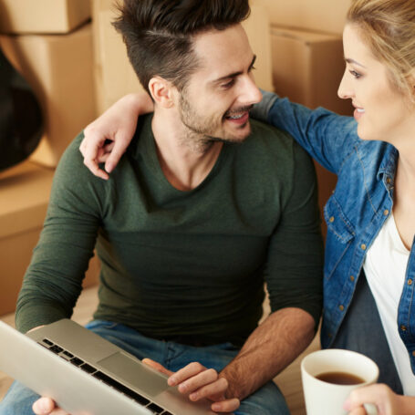 Millennial couple reviewing mortgage options for buying a home in California