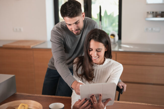 Millennial couple learning about California millennial mortgages