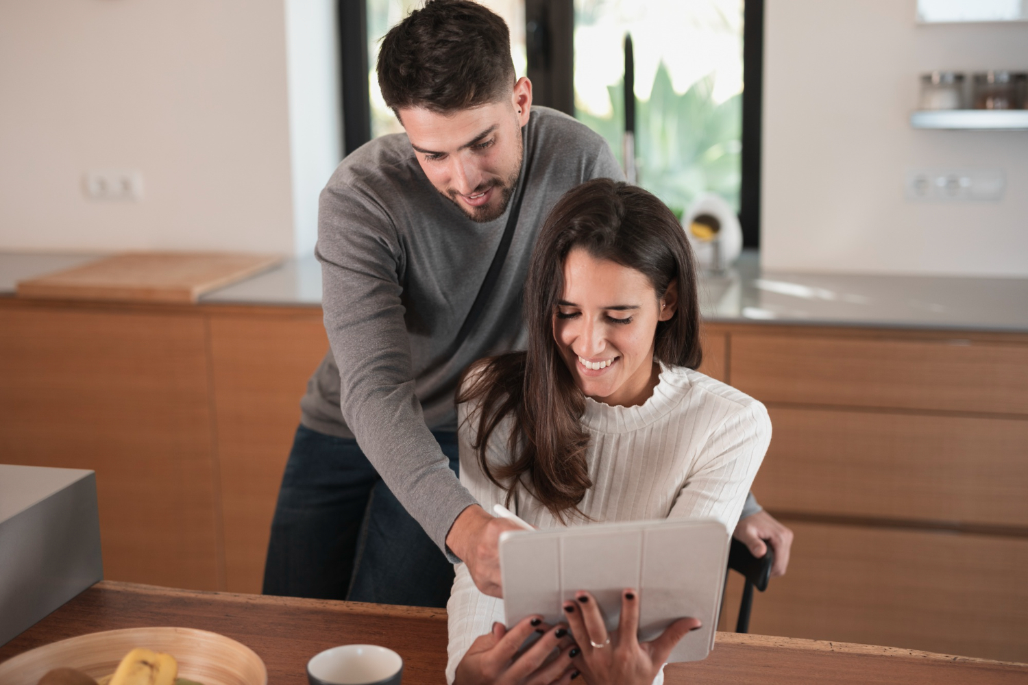 2148329353 Millennial couple learning about California millennial mortgages