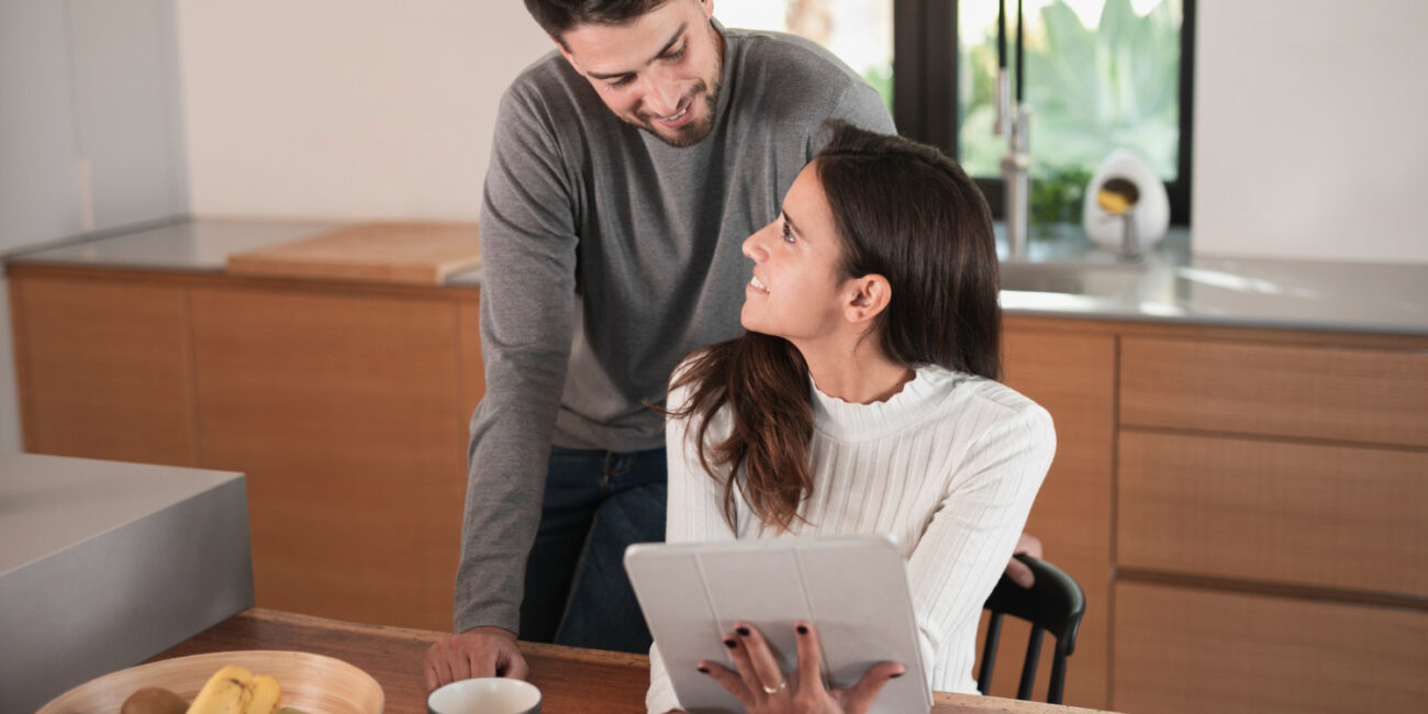 homebuyers reviewing documents explaining an appraisal gap during the home purchase process