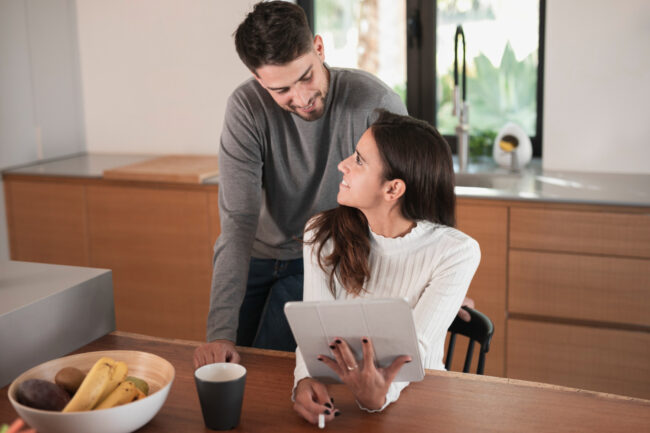 homebuyers reviewing documents explaining an appraisal gap during the home purchase process