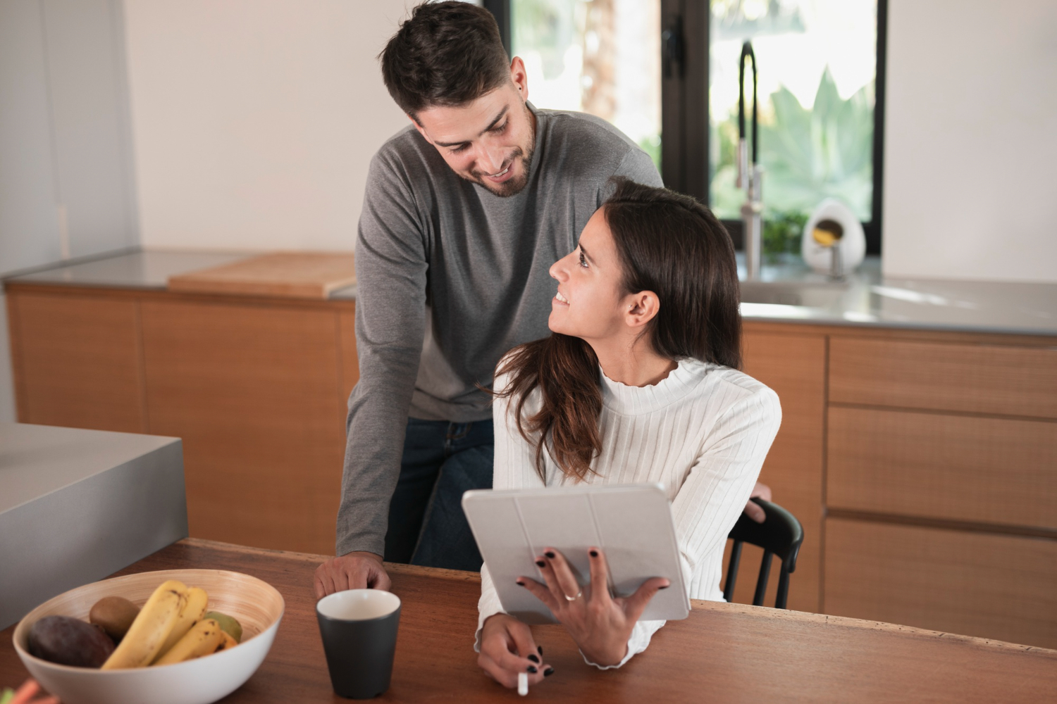 homebuyers reviewing documents explaining an appraisal gap during the home purchase process