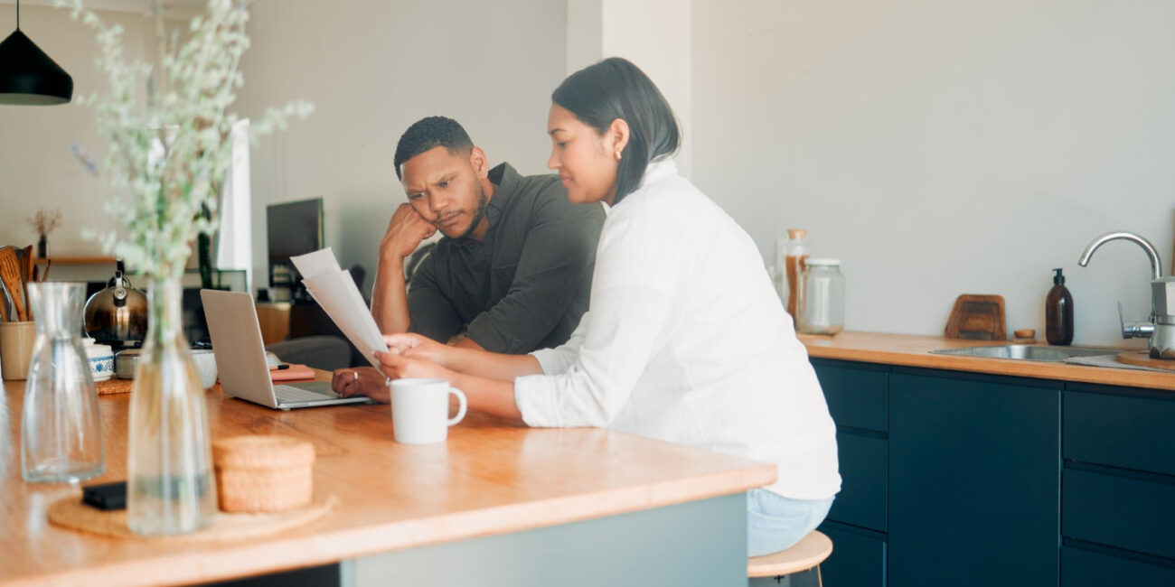 Couple reviewing California low down payment home loan options with mortgage lender