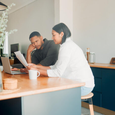Couple reviewing California low down payment home loan options with mortgage lender
