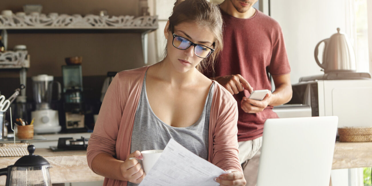 California buyer organizing variable income mortgage documents for a home purchase