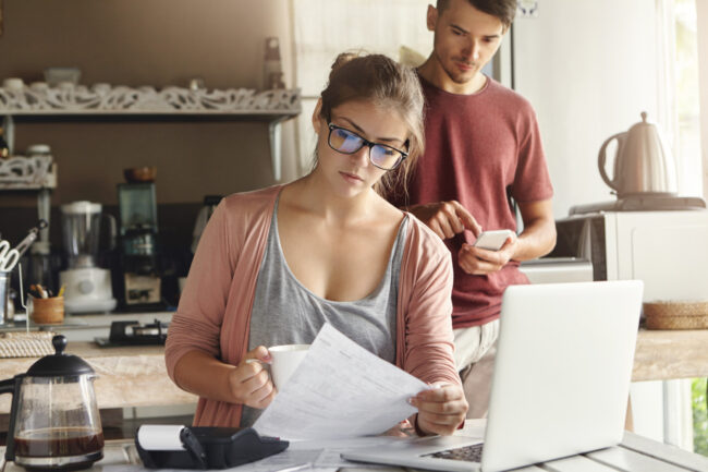 California buyer organizing variable income mortgage documents for a home purchase