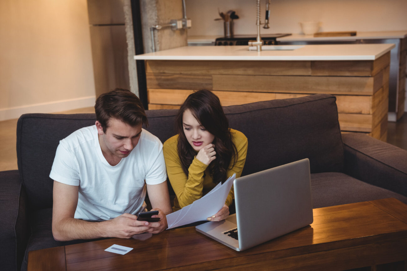 First-time buyers reviewing homeownership costs beyond the mortgage payment