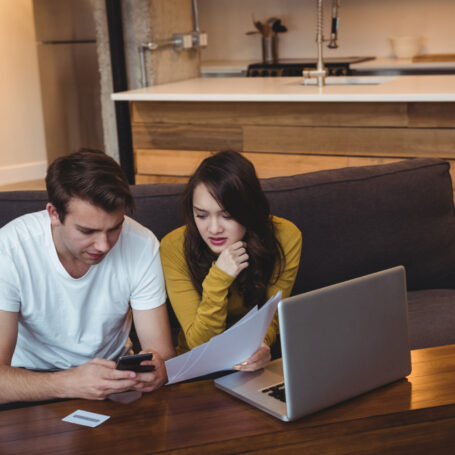 First-time buyers reviewing homeownership costs beyond the mortgage payment