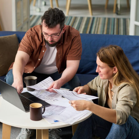 Homebuyer reviewing interest rate buydowns and monthly mortgage payment options