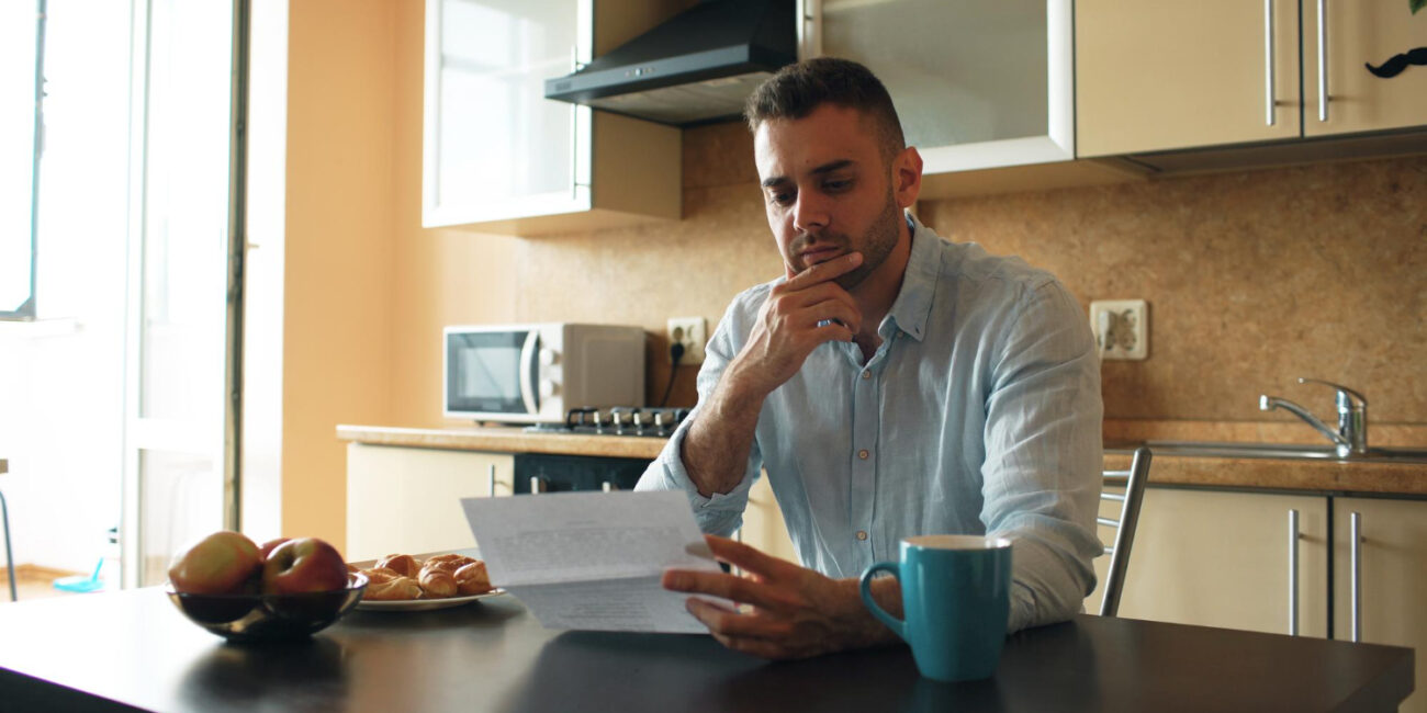 image-save-down-payment-first-or-pay-off-debt Prospective buyer deciding whether to save for a down payment first