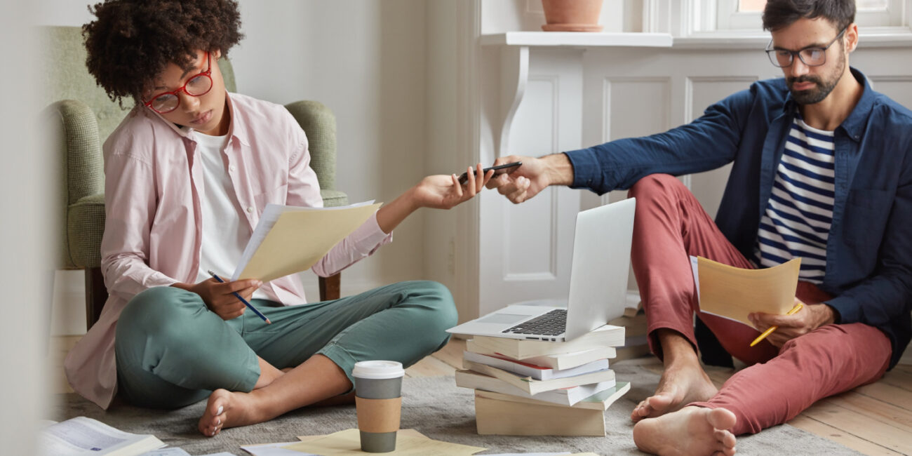 First-time homebuyer reviewing mortgage documents with a professional