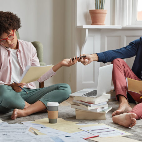 First-time homebuyer reviewing mortgage documents with a professional