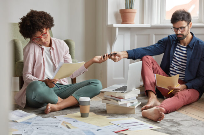 First-time homebuyer reviewing mortgage documents with a professional
