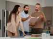 Professionals reviewing homeownership remains powerful long strategy and planning documents