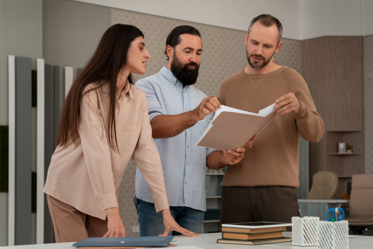 Professionals reviewing homeownership remains powerful long strategy and planning documents