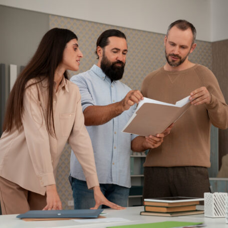Professionals reviewing homeownership remains powerful long strategy and planning documents