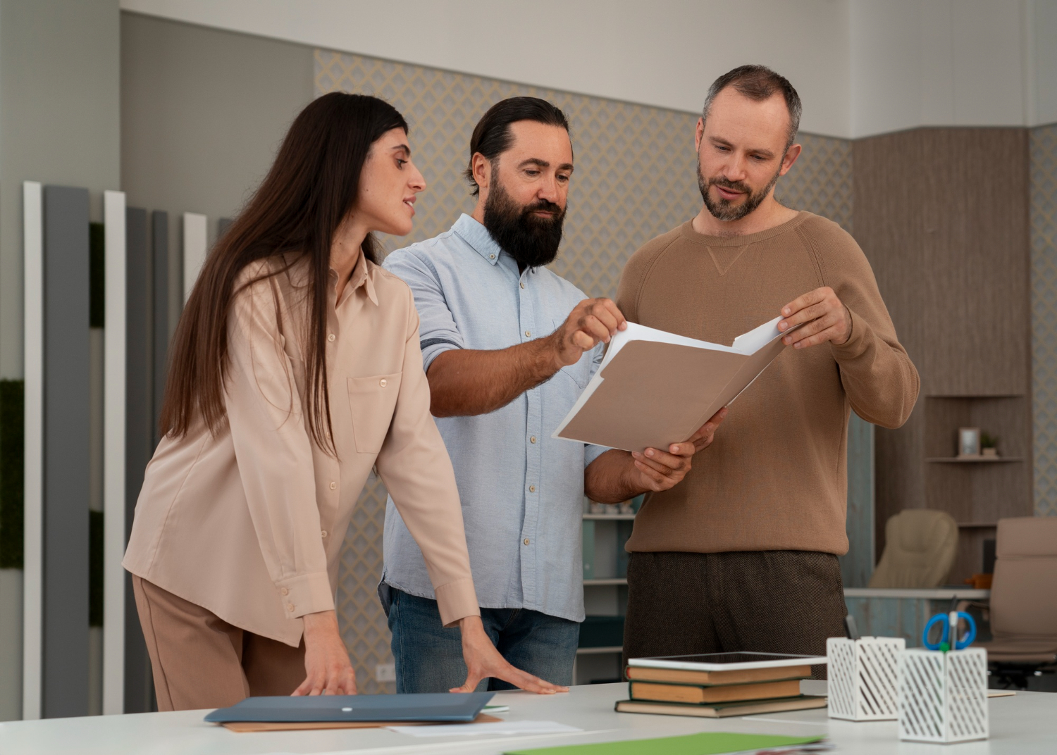 Professionals reviewing homeownership remains powerful long strategy and planning documents