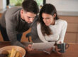 California homebuyers completing a mortgage offer comparison with an advisor
